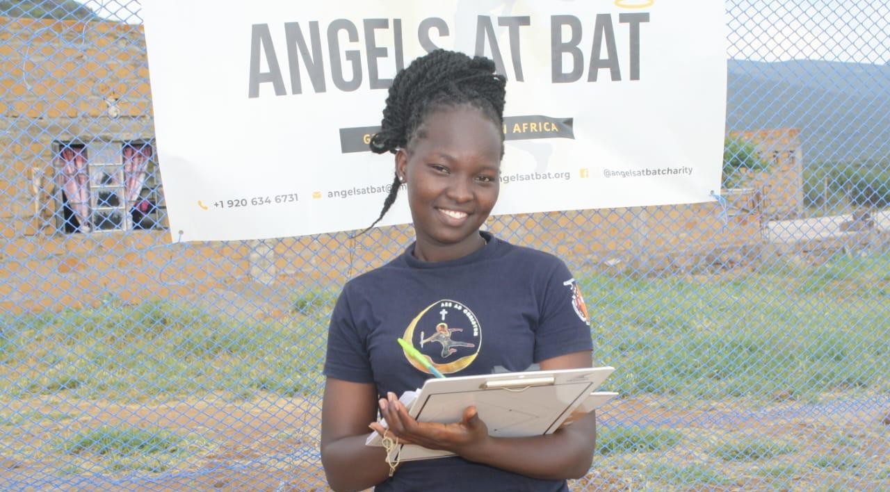 Coach holding clipboard during training
